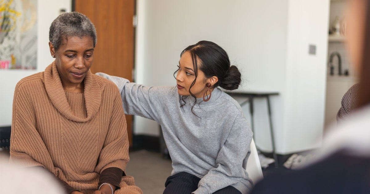 A clinician supporting a client at home